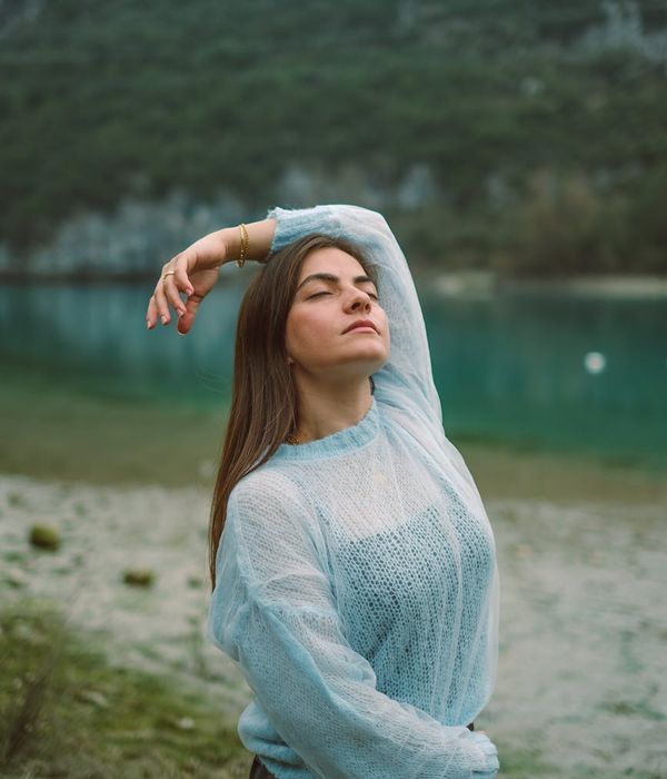 Woman in a calm yoga pose symbolizing inner harmony.